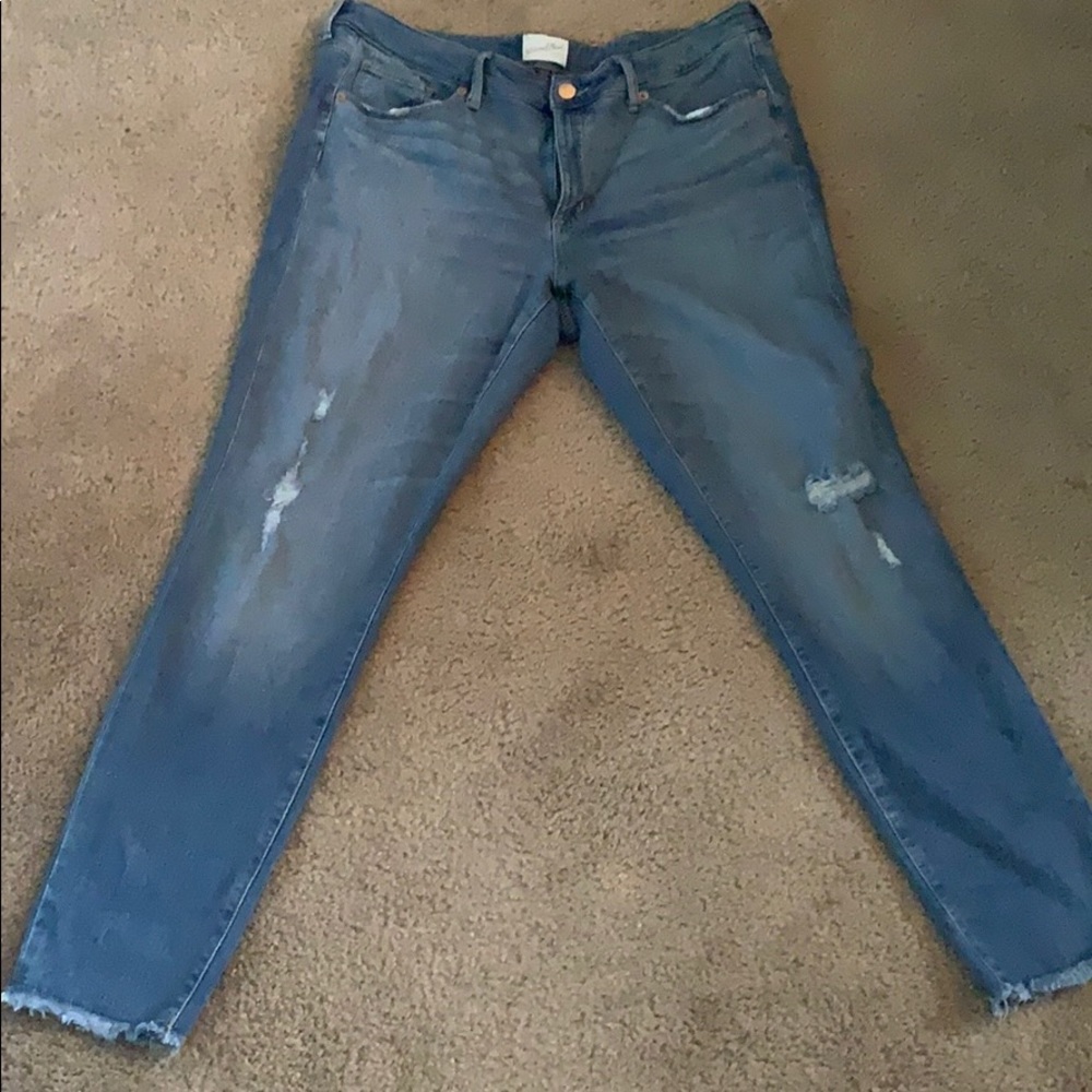Slightly ripped skinny jeans.